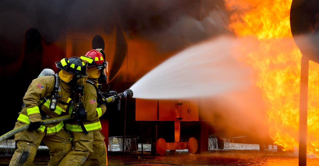 Firefighters in full turnout gear and SCBA