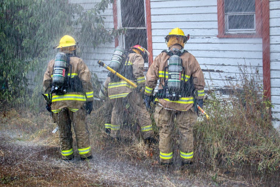 Structural firefighters in full PPE with MSA SCBA at building fire