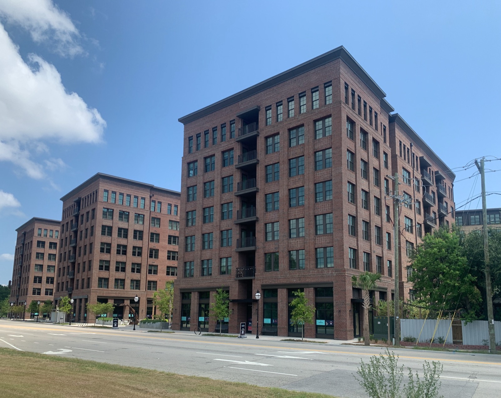 Modern American mid-rise mixed-use apartment building, the height range covered by the single-stair provision